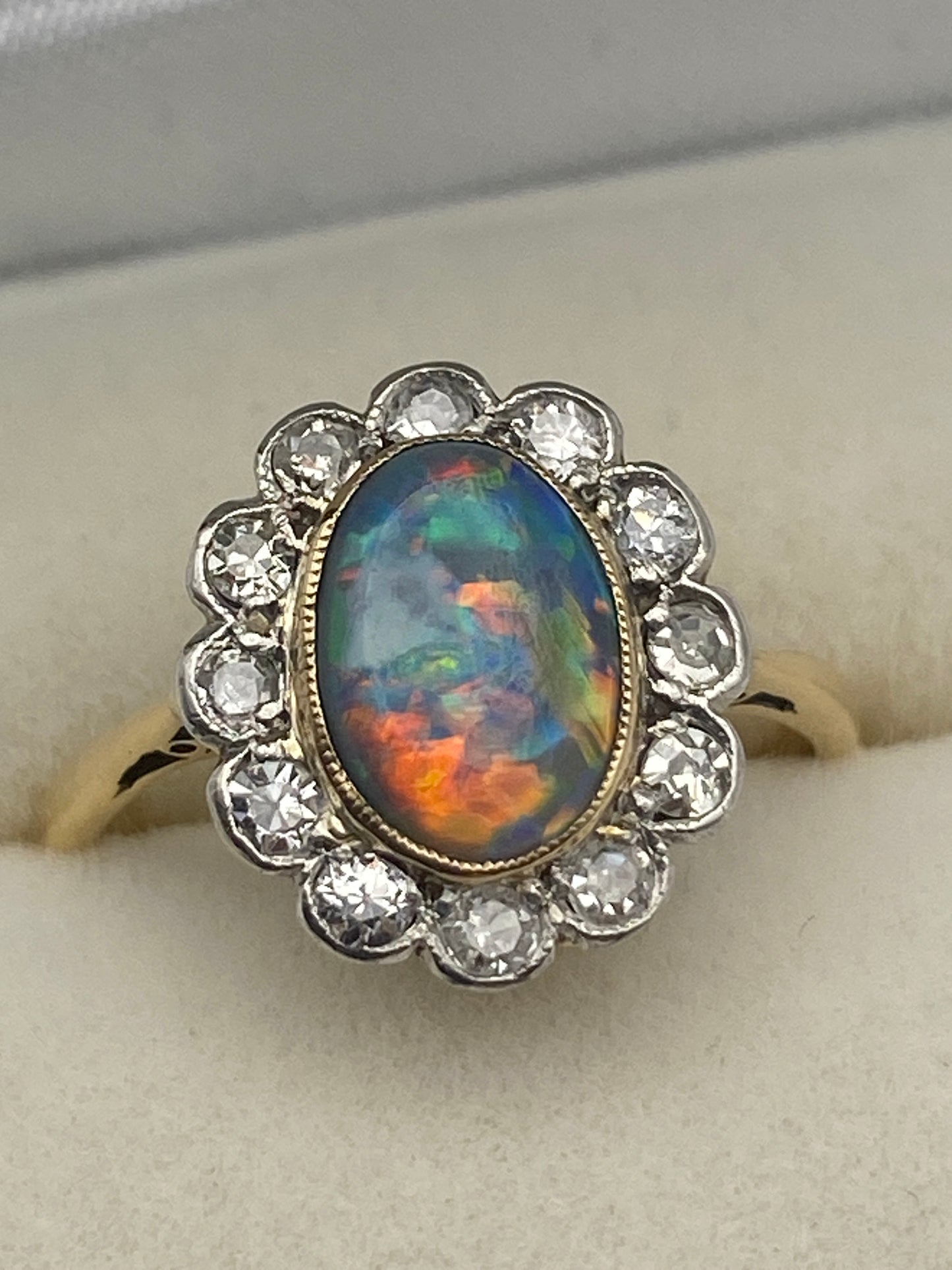 Fine Black Opal & Diamond Cluster Ring
Pre-Owned | Ring Size: UK K½