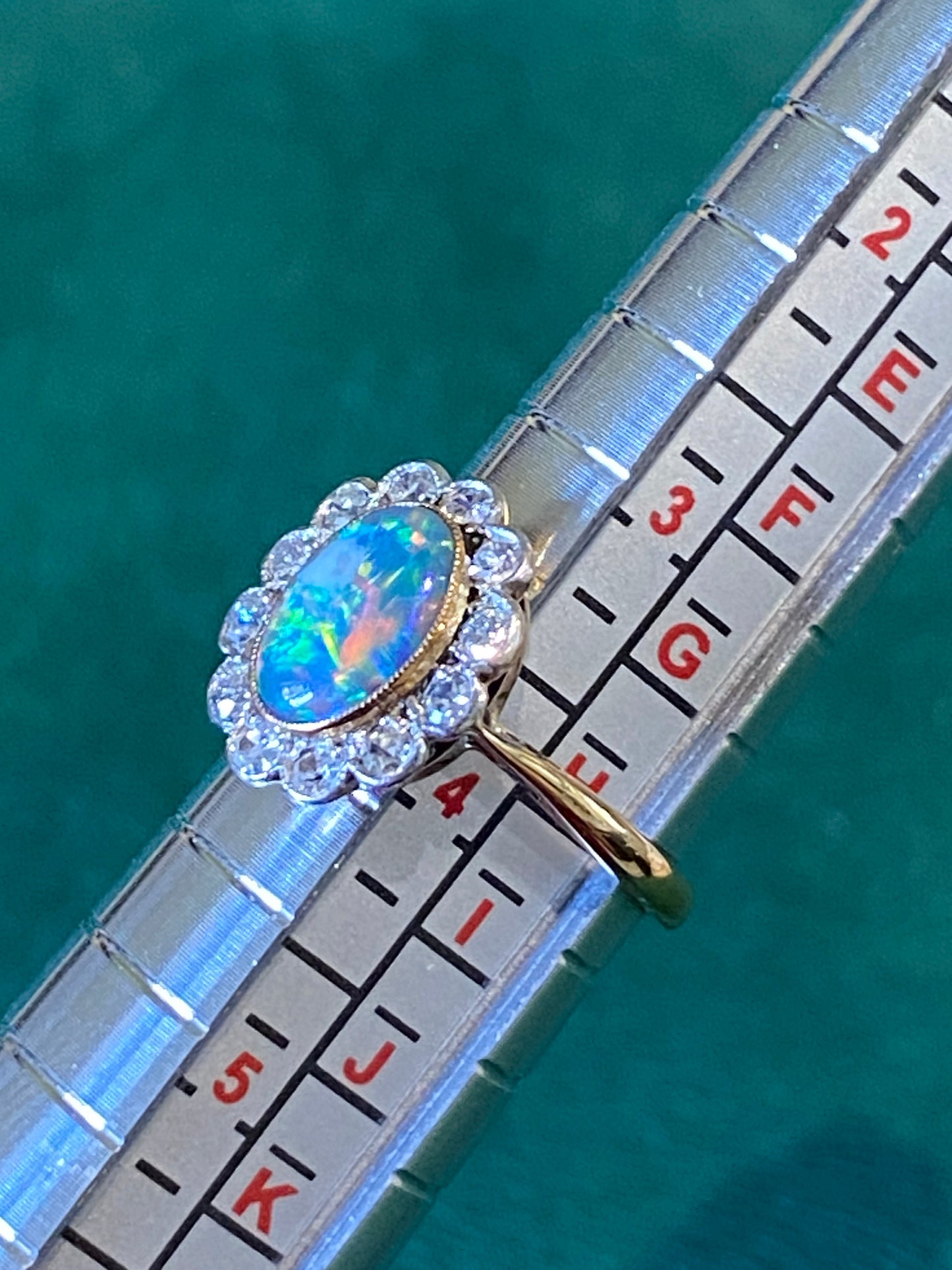 Fine Black Opal & Diamond Cluster Ring
Pre-Owned | Ring Size: UK K½