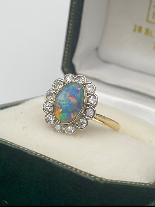Fine Black Opal & Diamond Cluster Ring
Pre-Owned | Ring Size: UK K½